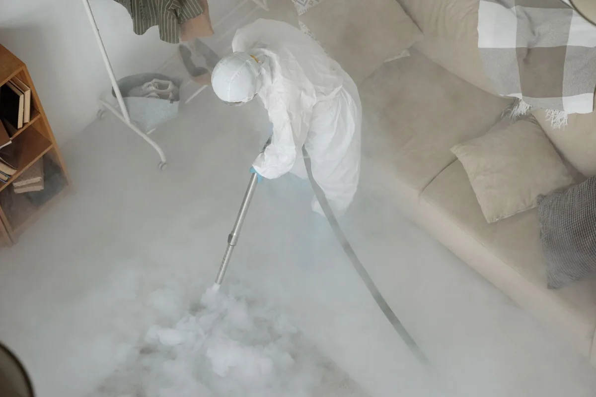 Biohazard cleanup technician in protective equipment, Sturgeon Bay, WI
